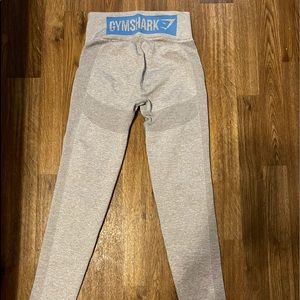 Gymshark leggings size small. Light gray color with blue “gymshark” logo.